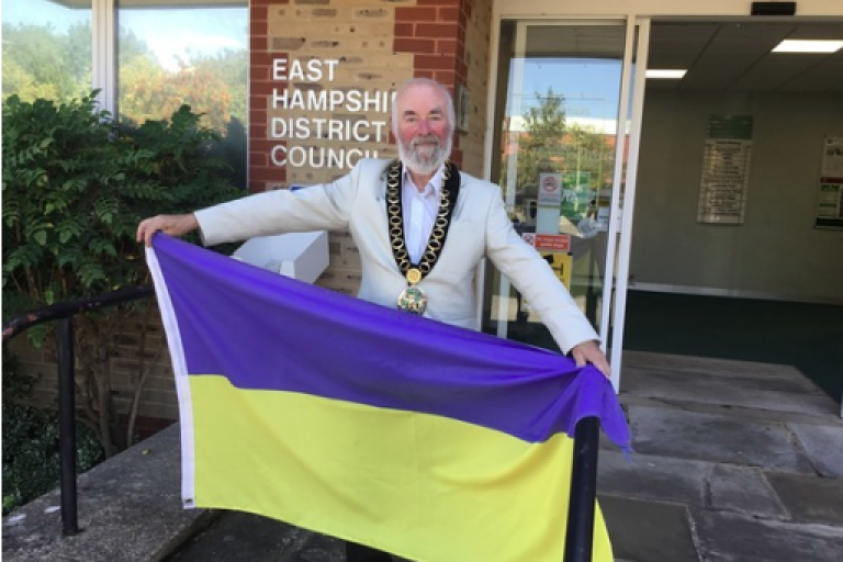 Cllr Anthony Williams with the Ukraine flag