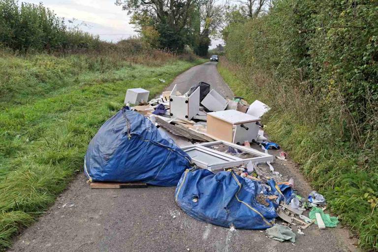 Fly tip in the middle of a road