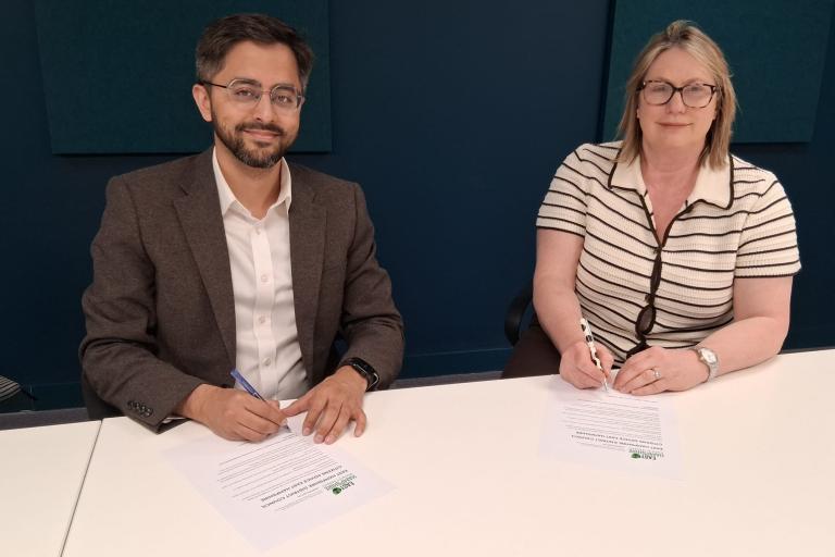 Cllr Adeel Shah and Helen Drake of CAEH