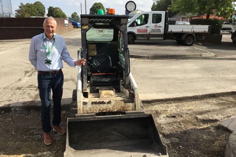 Cllr Costigan with digger